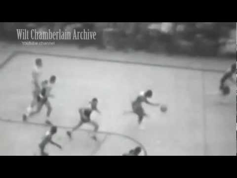 Bill Russell Jumps Over Man on Fast Break